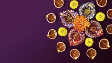 Mandala surrounded by Diwali candles