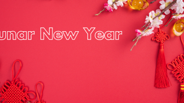 Red background with lunar new year decorations and text saying "lunar new year"