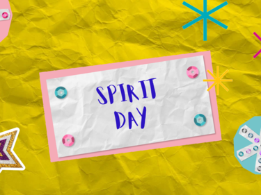 "Spirit Day" in text on a paper with stars around it.
