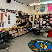 Indigenous room full of indigenous art, drums, and décor.