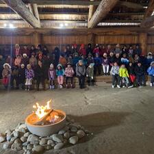 Students at a long house.
